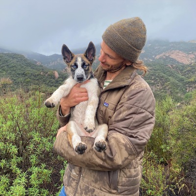 Andrew Lococo during hike with his pet dog, Ruby Roo.